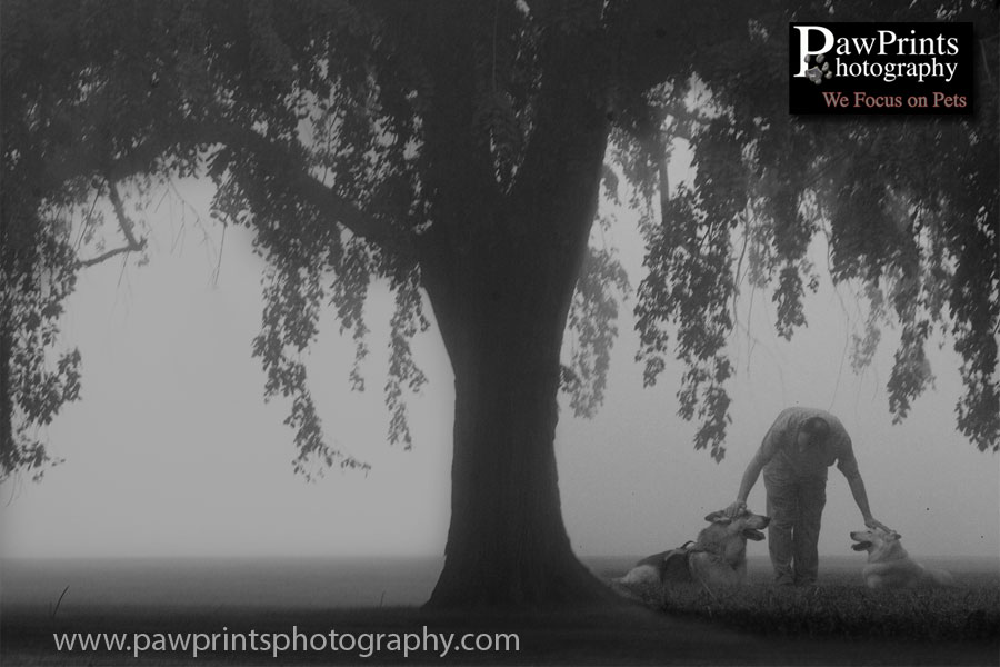 Rocky and his owner under a tree